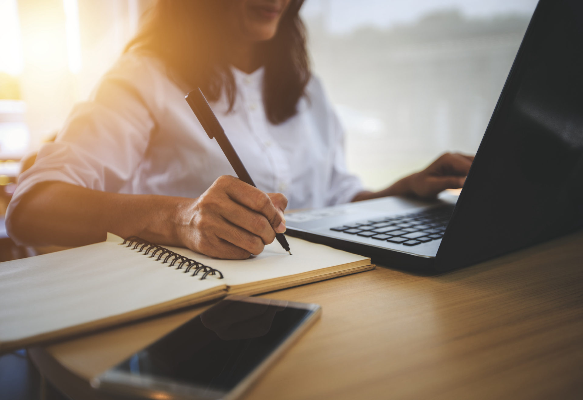 Young woman with learning language during online courses using netbook